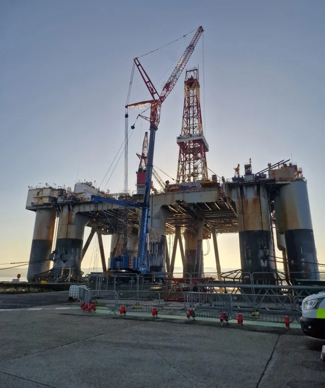 Small image of crane hire sector with crane in action