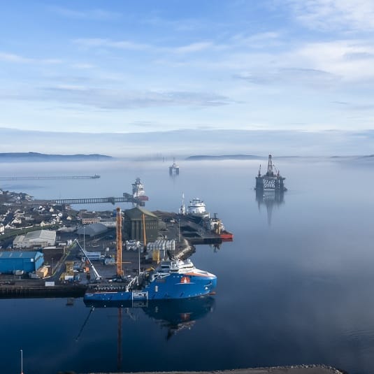 Large offshore oil rig surrounded by ocean