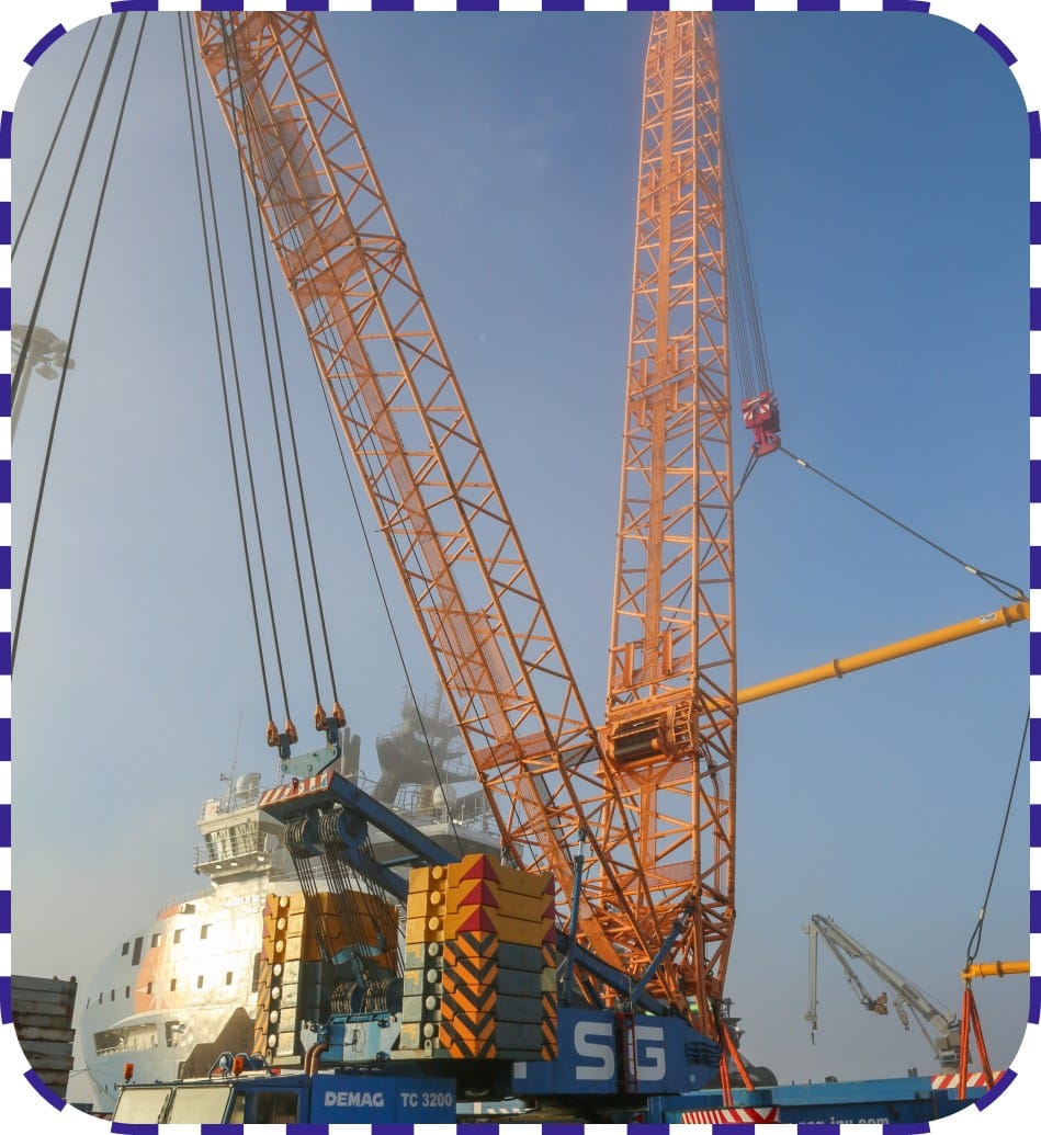 Quayside crane lifting heavy load