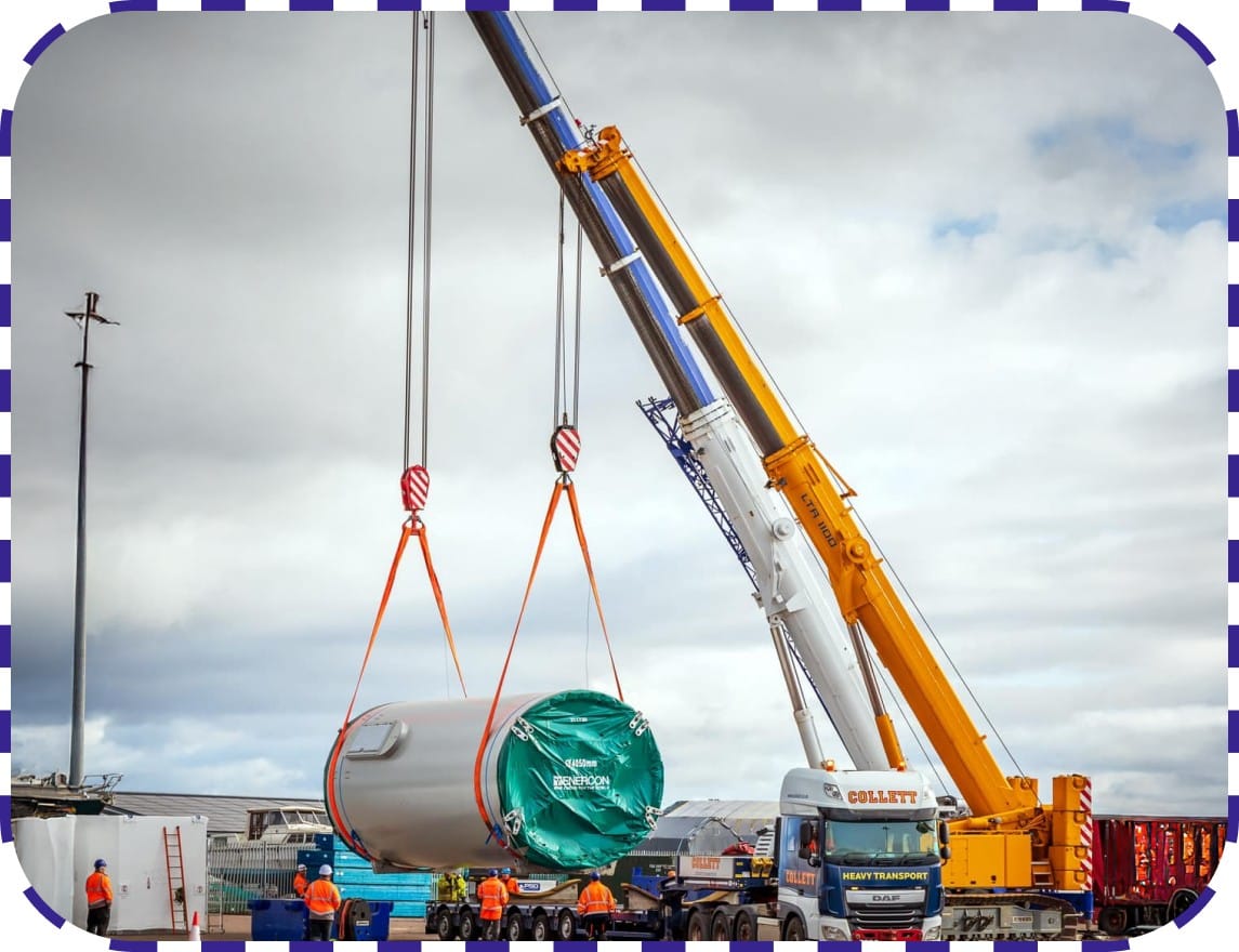 Wind turbine and crane working on offshore renewable energy setup