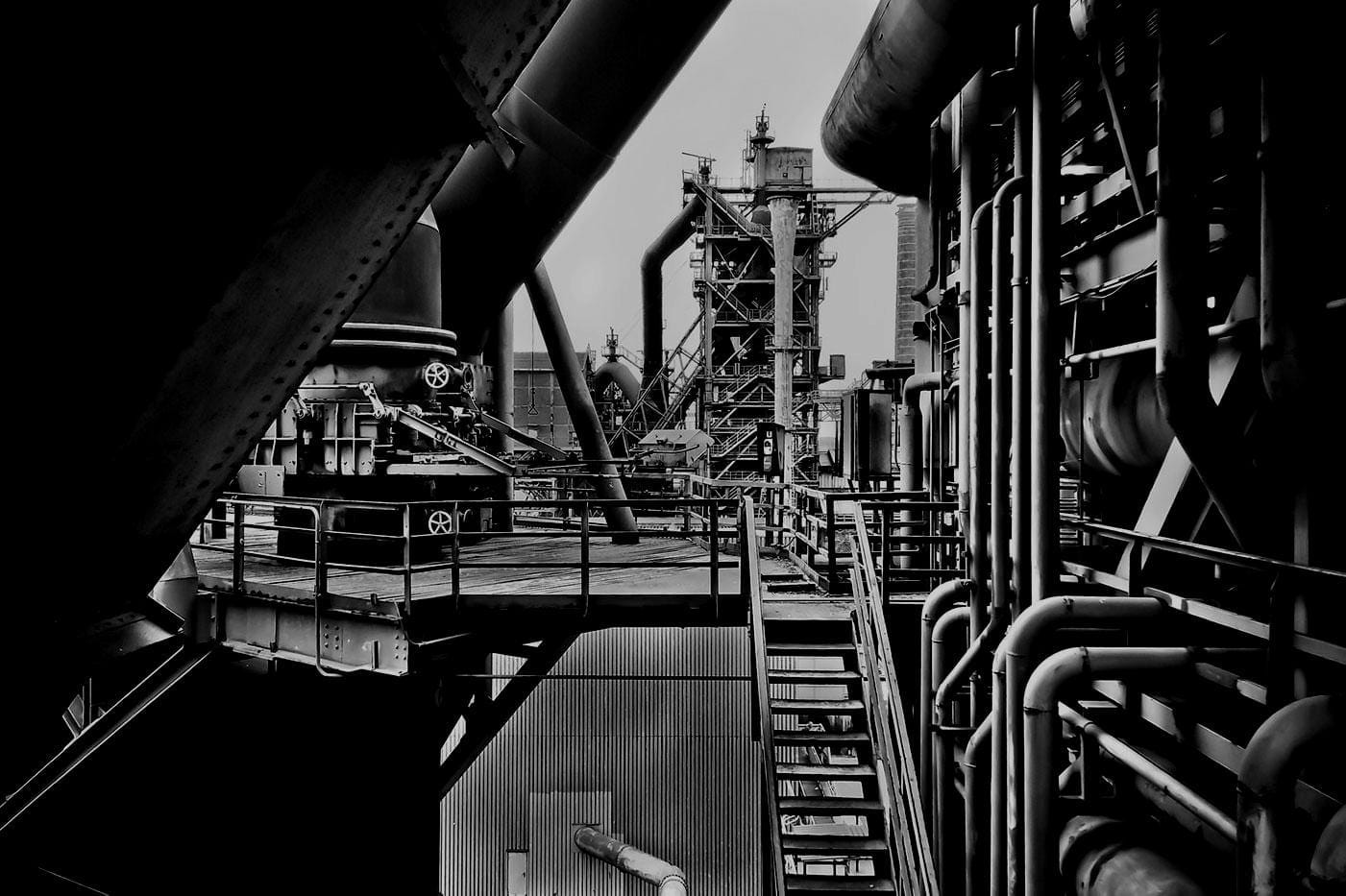 Black and white photo of port operations and logistics infrastructure