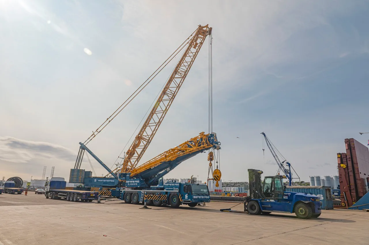 Efficient crane hire in action at a marine construction site
